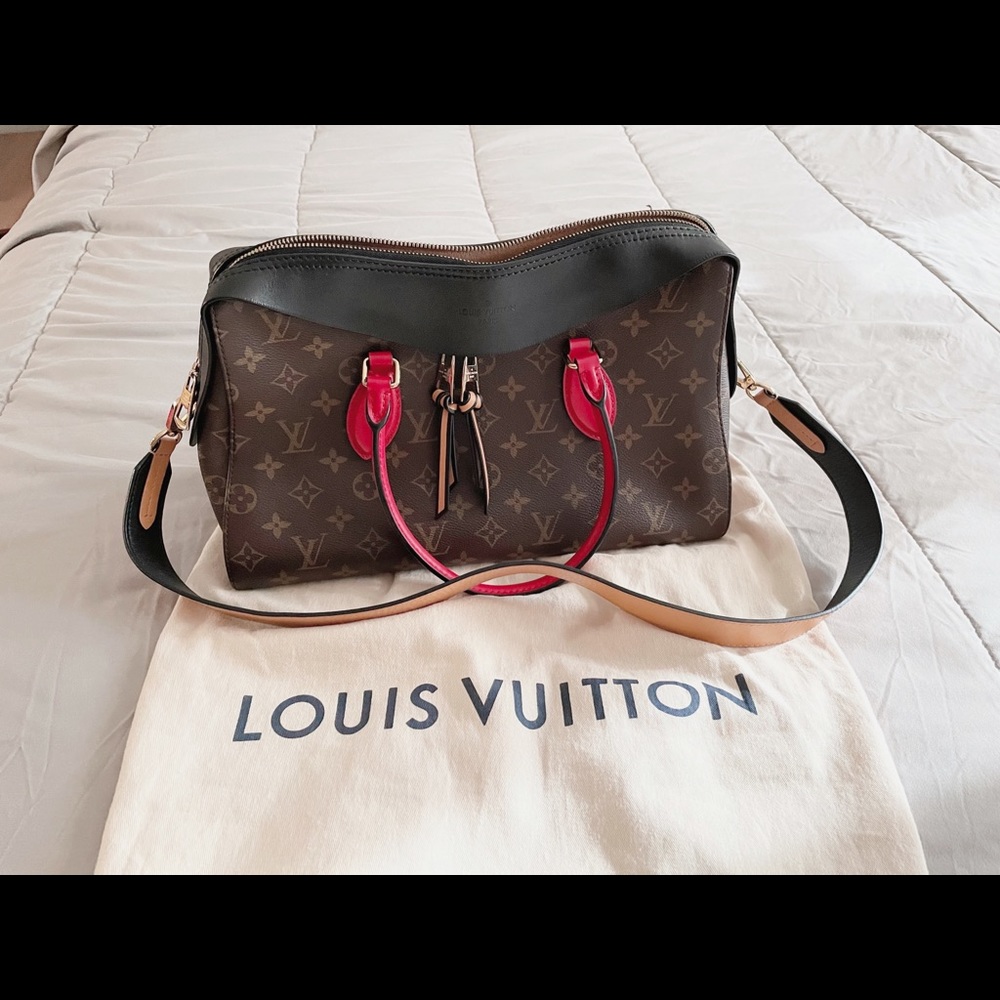 Authentic Louis Vuitton Tuileries bag, used but in pristine condition.